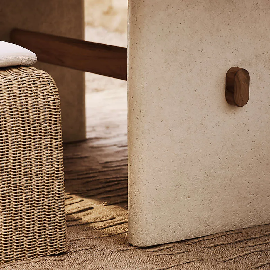 Stone, wood and woven furniture in the same gallery.